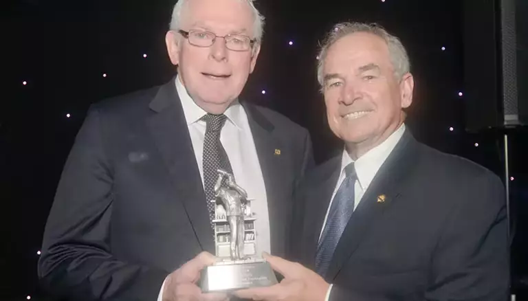 2018 Pillar of Pharmacy: Ray Murphy | Picture of CFP' sExecutive Director, Dayle Acorn handing the award to Ray Murphy