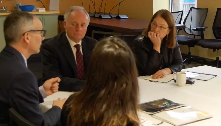 NS expands pharmacy program for mental health | Picture of executives discussing a topic in a meeting room - The Canadian Foundation For Pharmacy