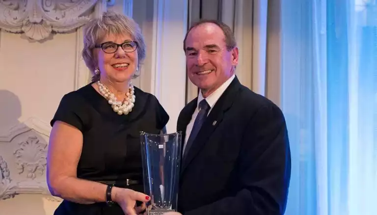 Picture of Carole McKiee receiving her award from Dayle Acorn - The Canadian Foundation For Pharmacy
