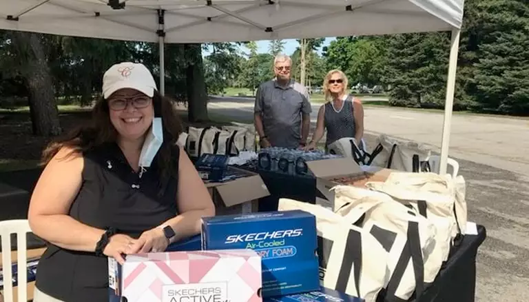 Par for the course | Image of CFP's board members volunteering at a golf tournament - The Canadian Foundation For Pharmacy