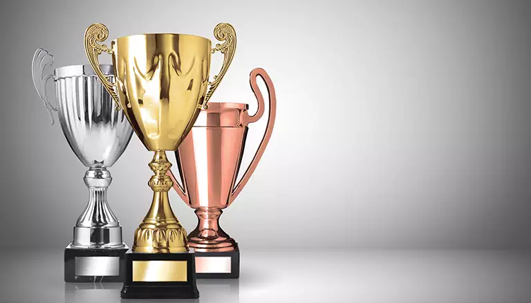 Thank you, pharmacy association presidents | Picture of Three Trophies next to each with a grey background - The Canadian Foundation For Pharmacy